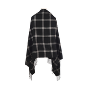 Back view of black and white plaid shawl wrap with fringe on a white background